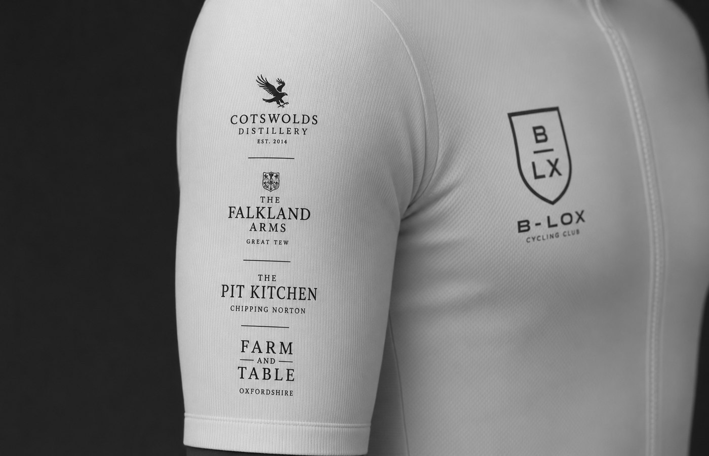 White B-LOX jersey sleeve printed with the Selects — Cotswolds Distillery, The Falkland Arms, The Pit Kitchen, Farm and Table